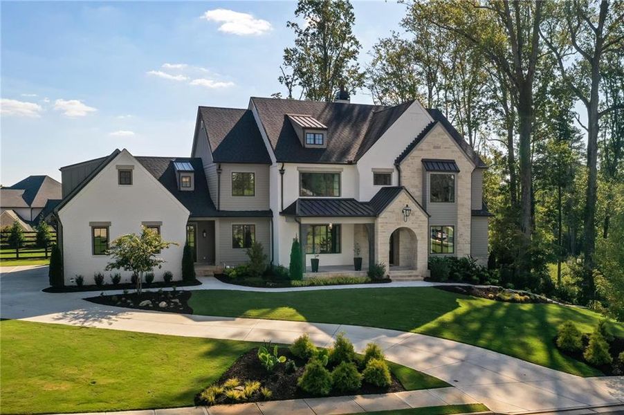 Front exterior of a new home in , Milton, GA, highlighting curb appeal (Image 36).
