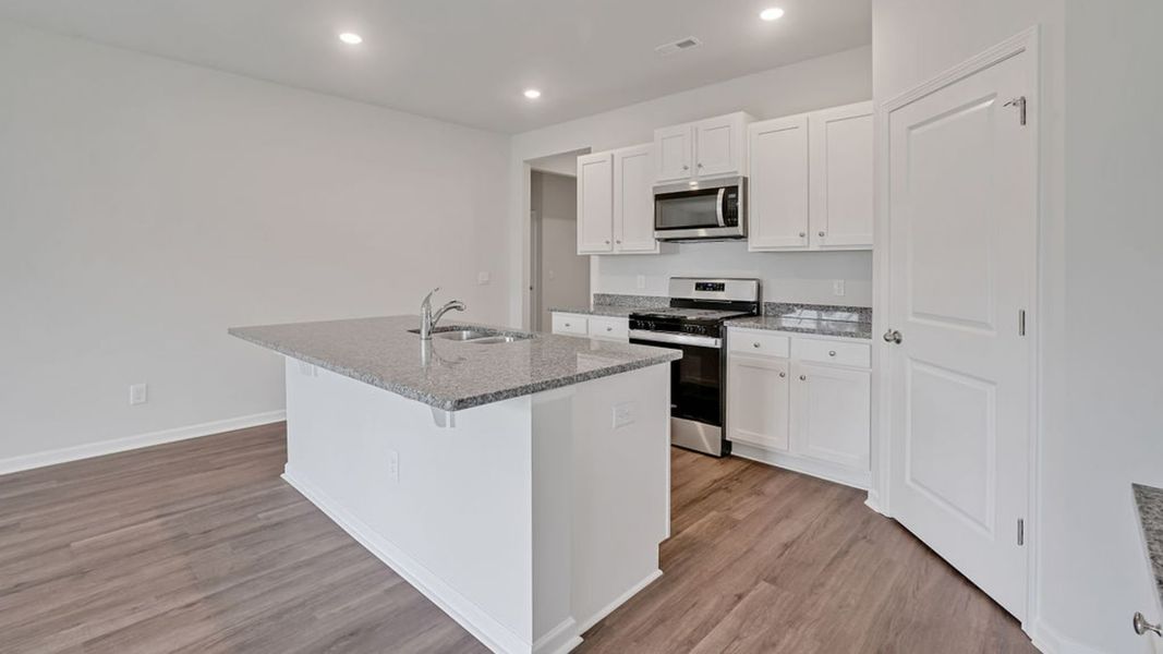 Representative furnished interior of a home built from the CALI by D.R. Horton in Vineyard Trail, Jacksonville (Image 8).