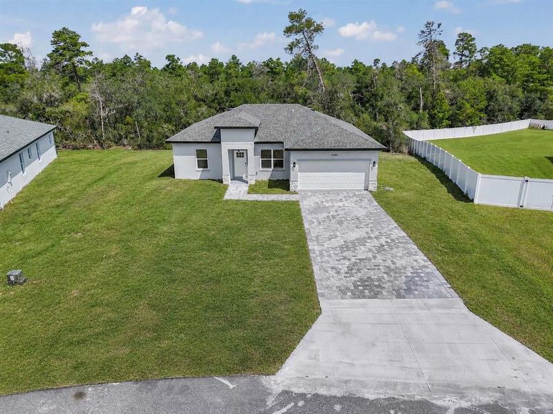 Front exterior of a new home in , Ocala, FL, highlighting curb appeal (Image 22).