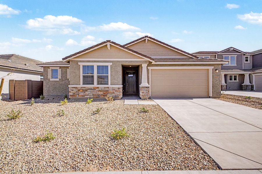 Front exterior of a new home in White Tank Vistas, Waddell, AZ, highlighting curb appeal (Image 1). Front exterior of a new home in White Tank Vistas, Waddell, AZ, highlighting curb appeal (Image 1).