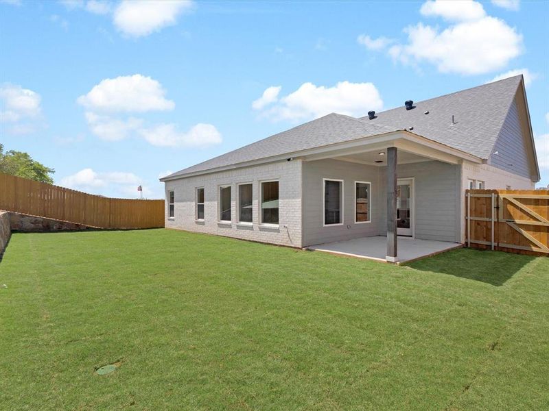 Exterior details and patio area of a home in , Springtown (Image 4).