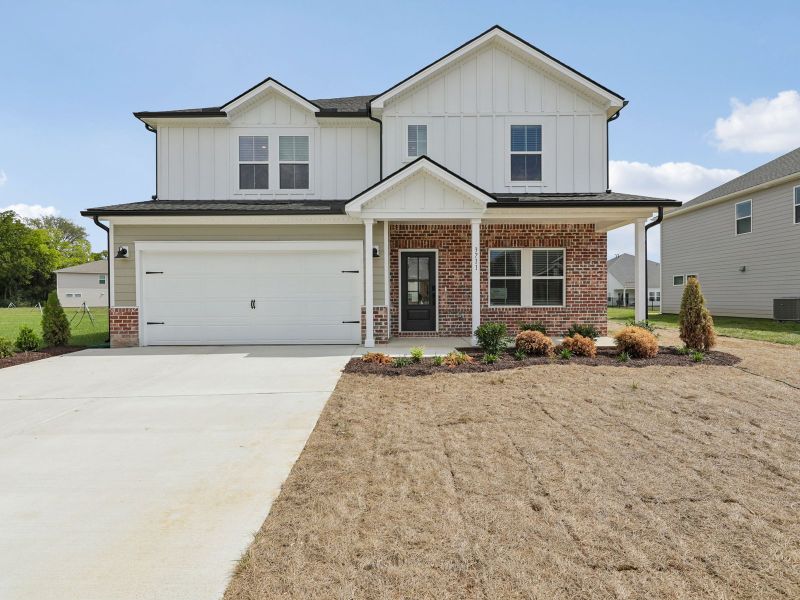 Front exterior of a new home in Carlton Landing, Rockvale, TN, highlighting curb appeal (Image 1). Front exterior of a new home in Carlton Landing, Rockvale, TN, highlighting curb appeal (Image 1).
