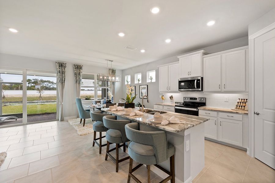 Representative furnished interior of a home built from the Delray by D.R. Horton in Coral Bay - Express & Tradition, North Fort Myers (Image 4).