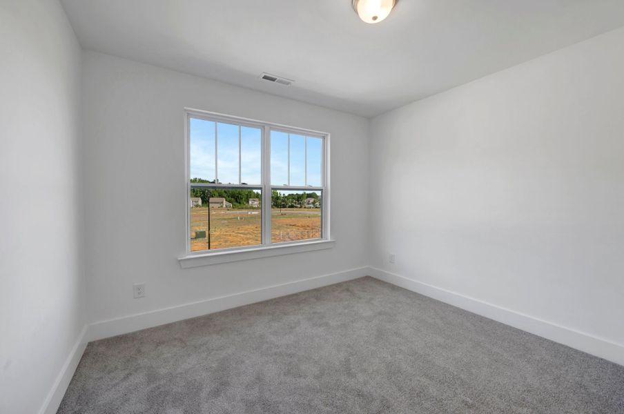 Spacious, unfurnished interior of a new home in Powell, Angier (Image 30).