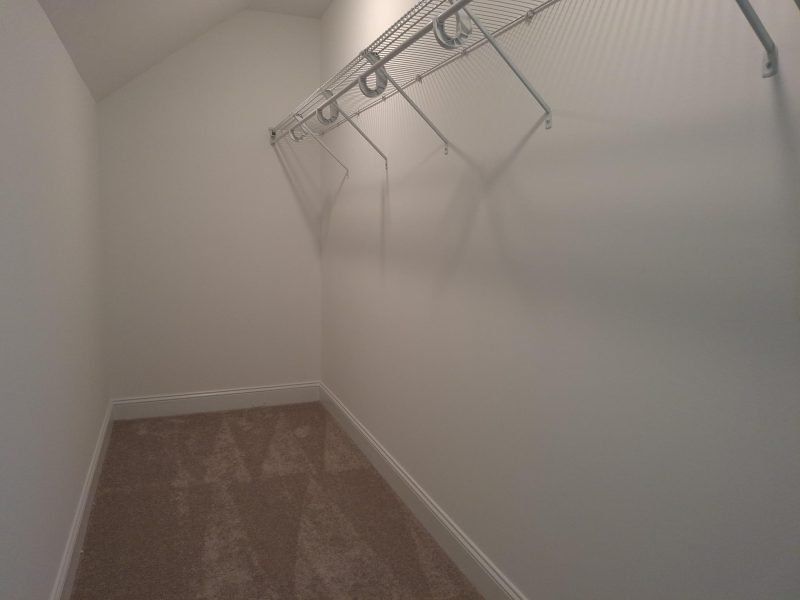 Spacious, unfurnished interior of a new home in Weybridge, Burlington (Image 63).