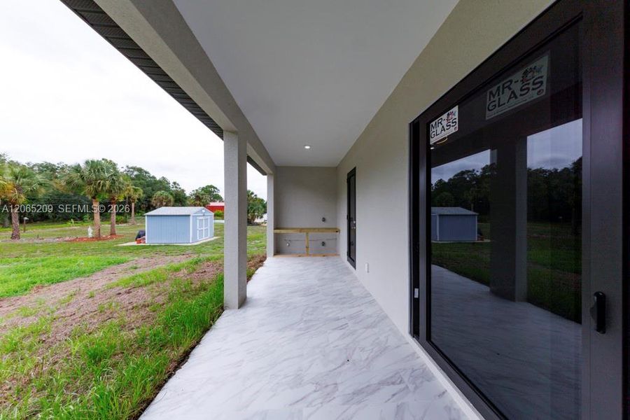 Exterior details and patio area of a home in , Lehigh Acres (Image 30).