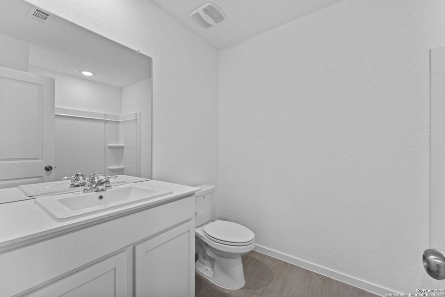 Furnished interior view inside a new home in Waterwheel: Cottage Collection, San Antonio (Image 11).