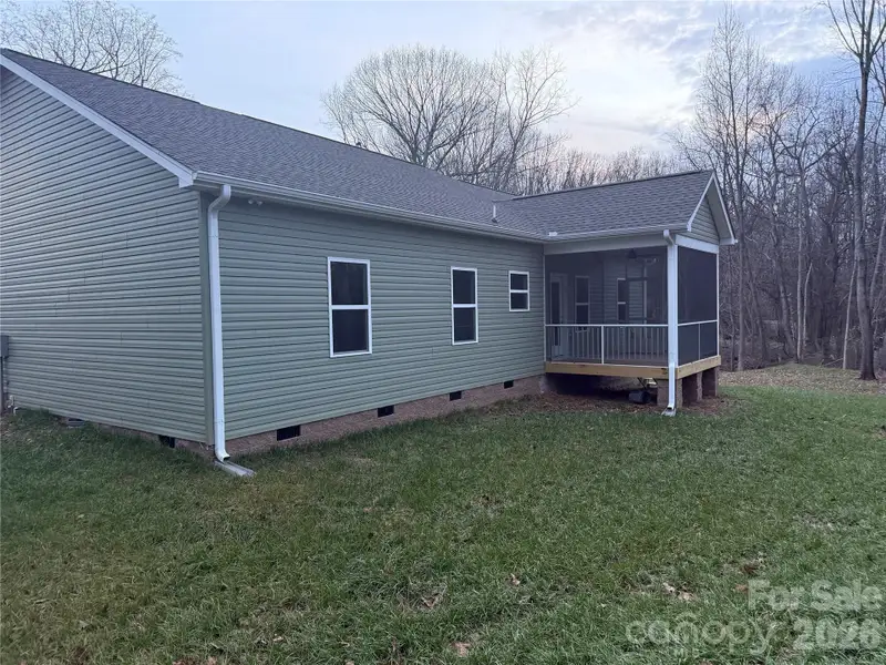 Exterior details and patio area of a home in , Statesville (Image 4).