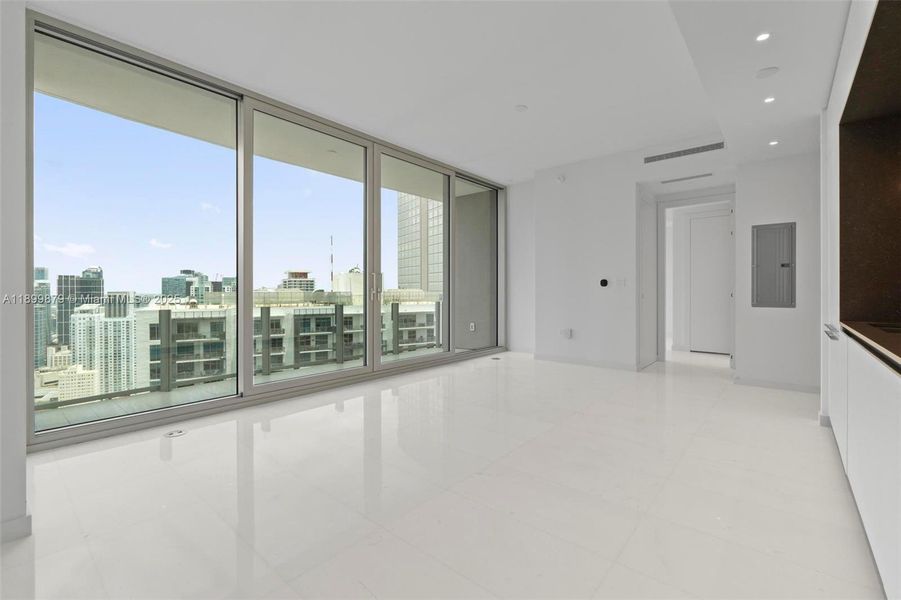 Spacious, unfurnished interior of a new home in Aston Martin Residences, Miami (Image 12).
