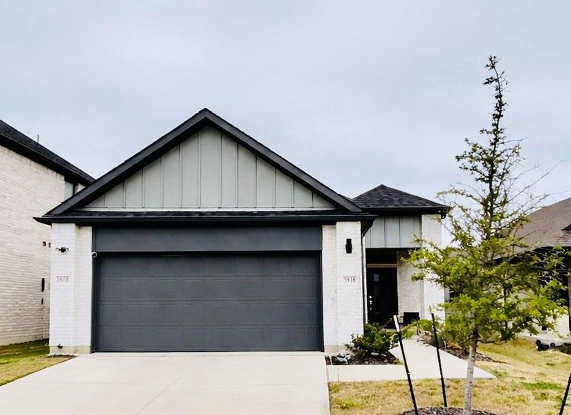 Front exterior of a new home in , Farmersville, TX, highlighting curb appeal (Image 1). Front exterior of a new home in , Farmersville, TX, highlighting curb appeal (Image 1).