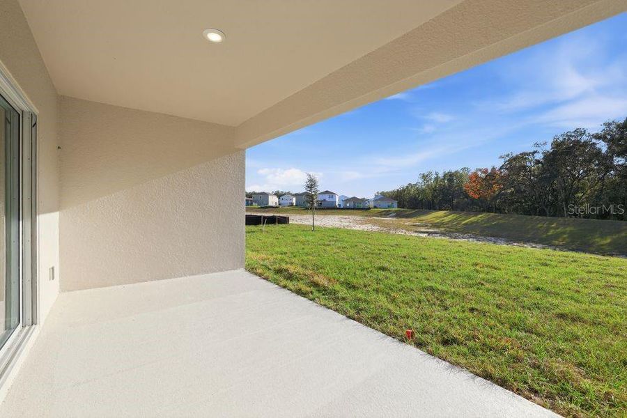 Exterior details and patio area of a home in Palm Wind, Hudson (Image 3).