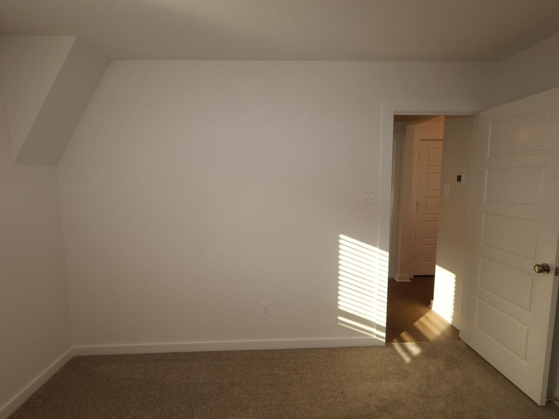 Spacious, unfurnished interior of a new home in Pinewood at Grand Texas, New Caney (Image 22).