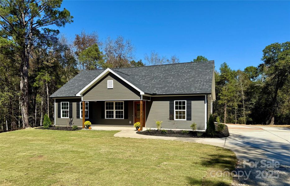 Front exterior of a new home in , Chester, SC, highlighting curb appeal (Image 12).