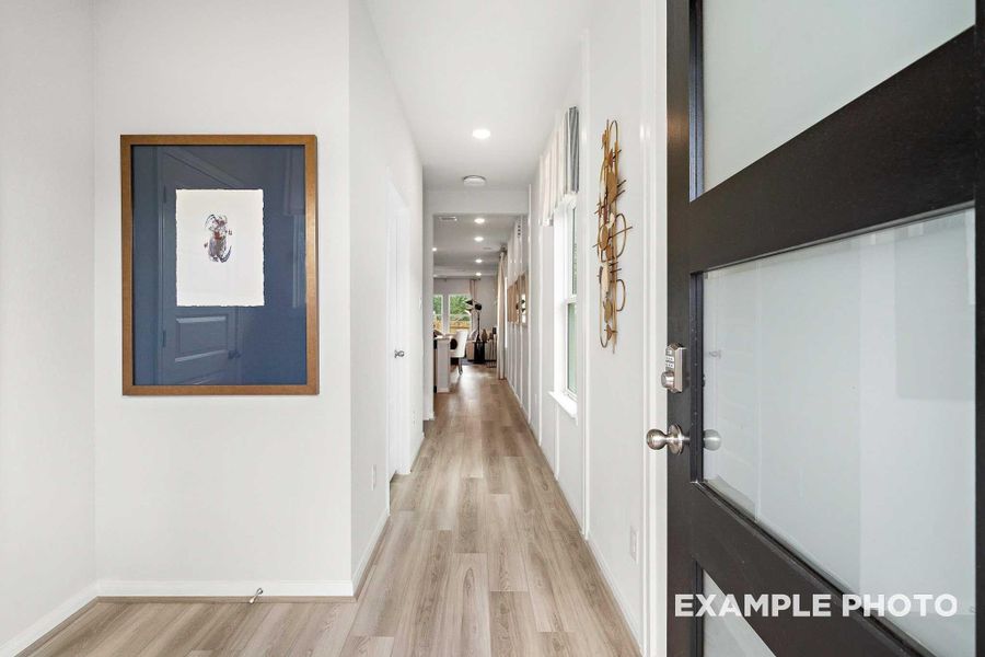Furnished interior view inside a new home in Caney Creek Place, Conroe (Image 3).
