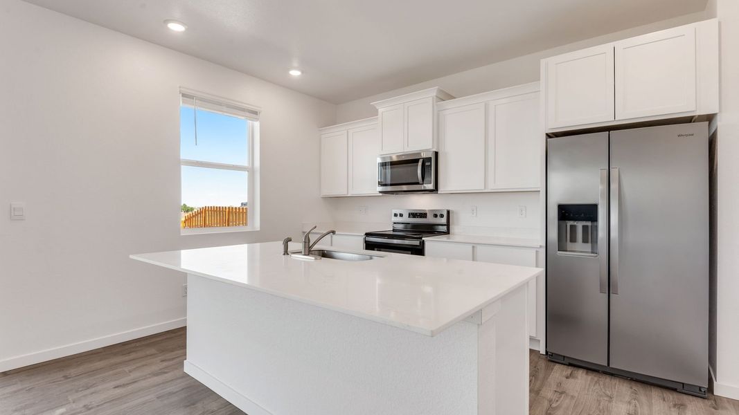 Furnished interior view inside a new home in Settlers Crossing, Commerce City (Image 6).