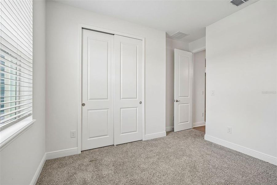 Spacious, unfurnished interior of a new home in Legends Preserve - Signature Series, Daytona Beach (Image 23).