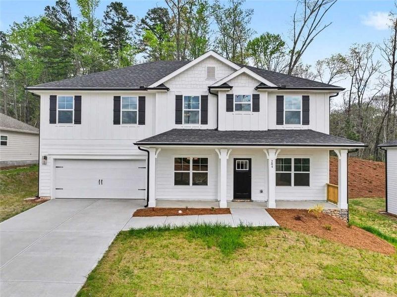 Front exterior of a new home in Thunder Ridge, Dawsonville, GA, highlighting curb appeal (Image 17).