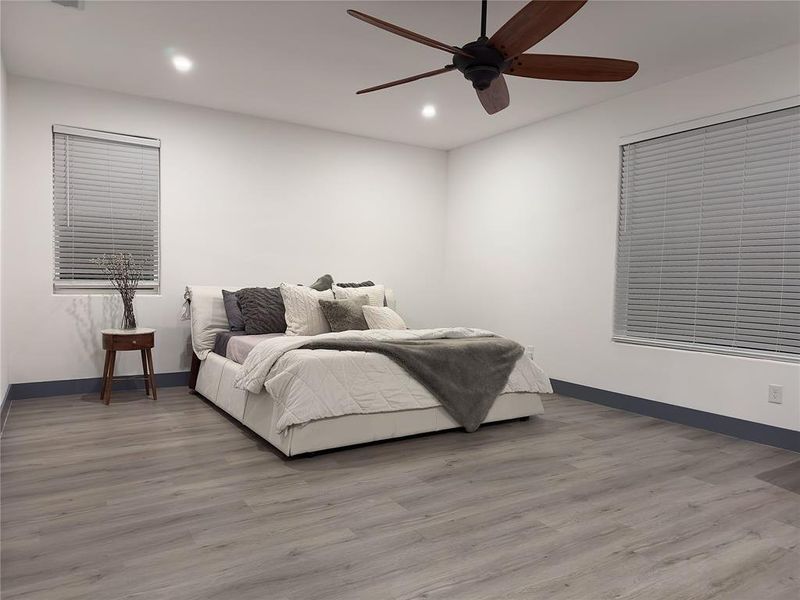 Primary Bedroom hardwood / wood-style flooring