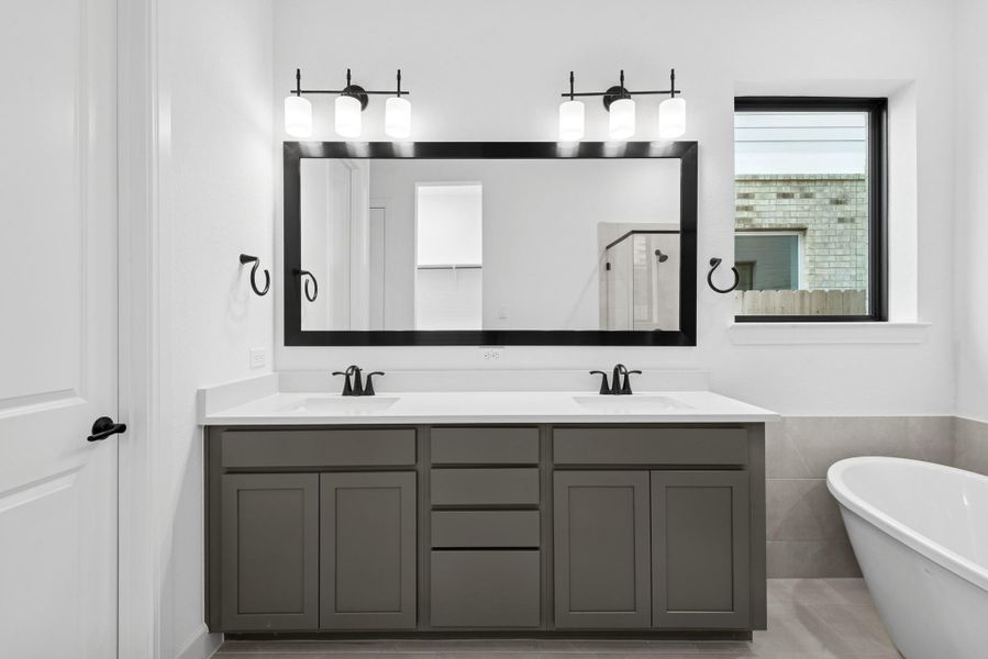 Furnished interior view inside a new home in Riceland - Enclave Row Collection, Mont Belvieu (Image 10).