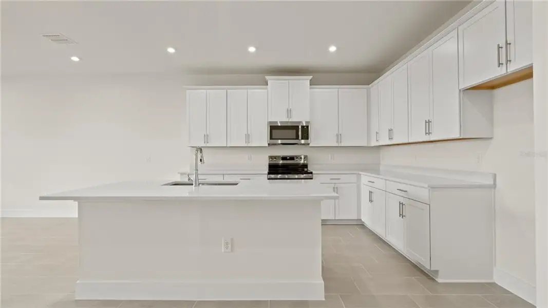 Furnished interior view inside a new home in Trailside, Mount Dora (Image 6). Furnished interior view inside a new home in Trailside, Mount Dora (Image 6).