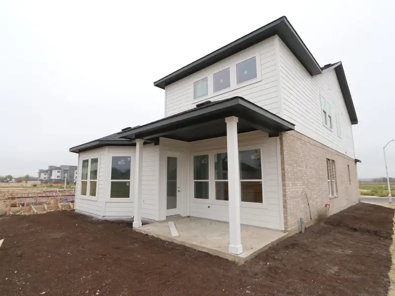 Exterior details and patio area of a home in Estancia West, Manchaca (Image 3).