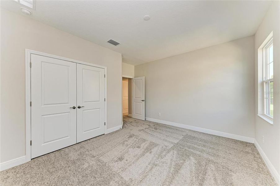 Spacious, unfurnished interior of a new home in Hidden Lakes, Brandon (Image 34).