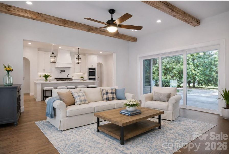 Family room w/12' ceilings & 8"x8" dropped wood beams - overlooks vaulted covered back porch - representative photo Family room w/12' ceilings & 8"x8" dropped wood beams - overlooks vaulted covered back porch - representative photo