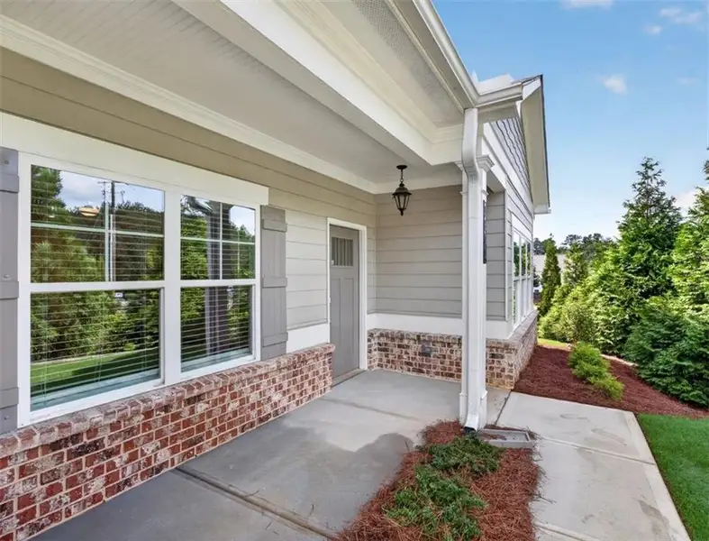 Exterior details and patio area of a home in Creekwood, Powder Springs (Image 4).