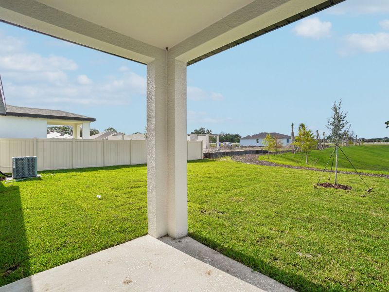 Exterior details and patio area of a home in Pine Ridge Meadows, Hudson (Image 3).
