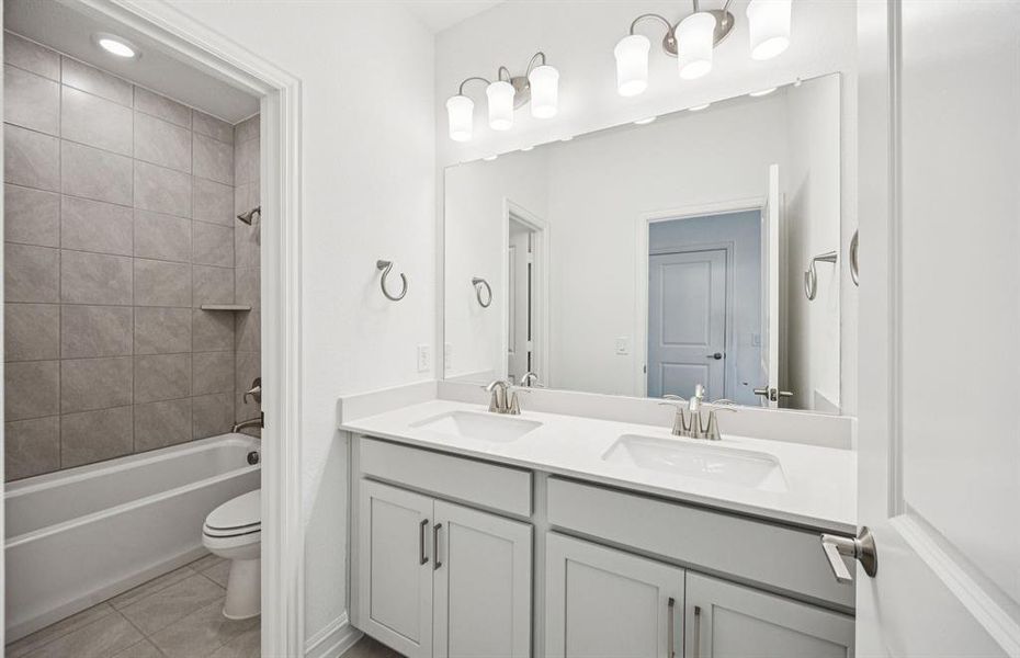 Upgraded secondary bath with elegant finishes Upgraded secondary bath with elegant finishes