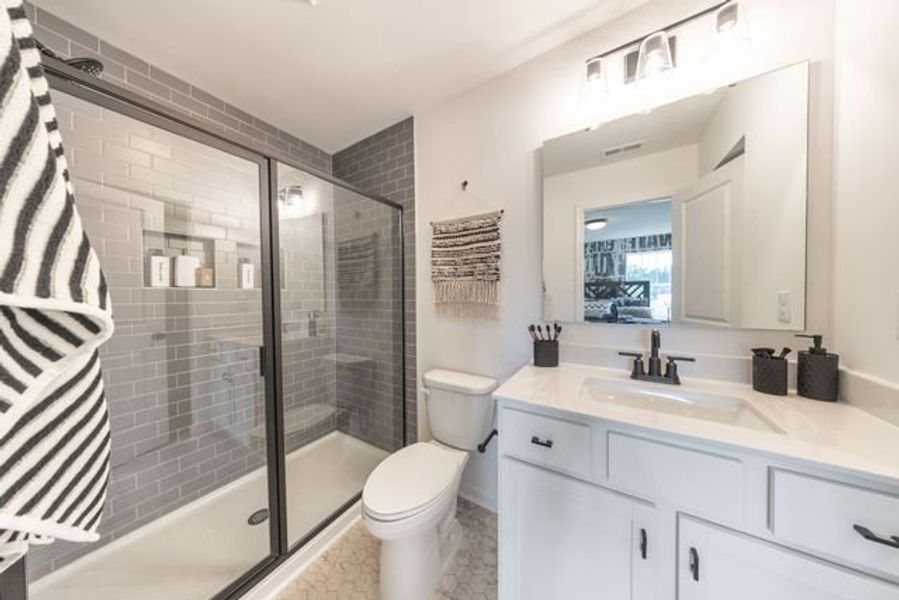 Representative furnished interior of a home built from the Myka TH by True Homes in Village at Reedy Creek Townhomes, Charlotte (Image 15).