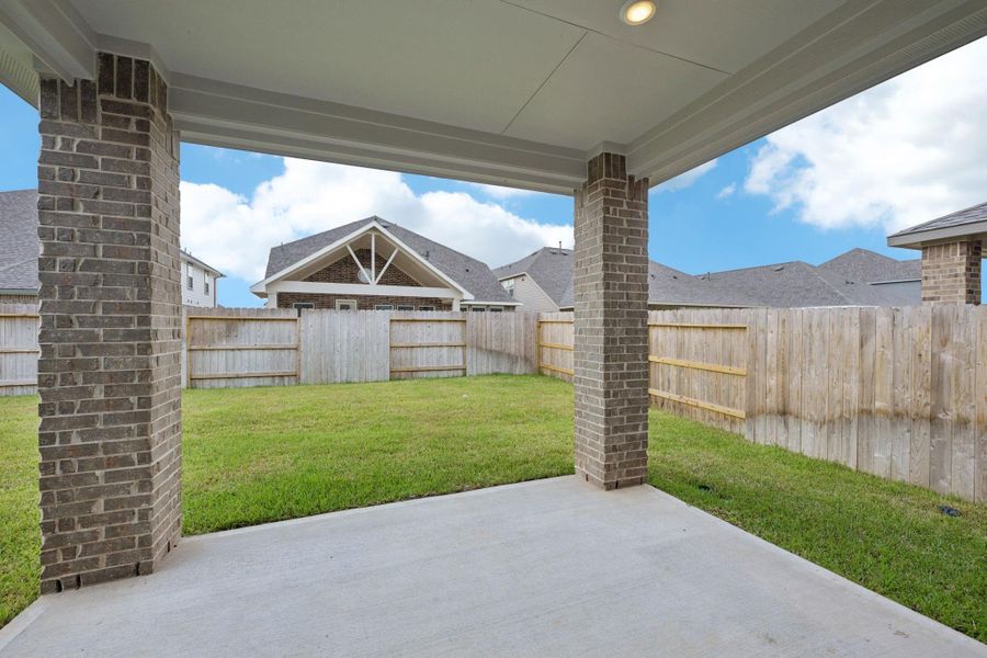 Exterior details and patio area of a home in Kingdom Heights, Rosenberg (Image 28). Exterior details and patio area of a home in Kingdom Heights, Rosenberg (Image 28).