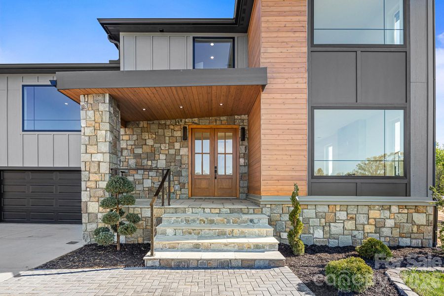 Exterior details and patio area of a home in , Flat Rock (Image 27).
