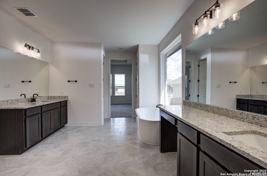 Furnished interior view inside a new home in The Reserve at Potranco Oaks, Castroville (Image 14).