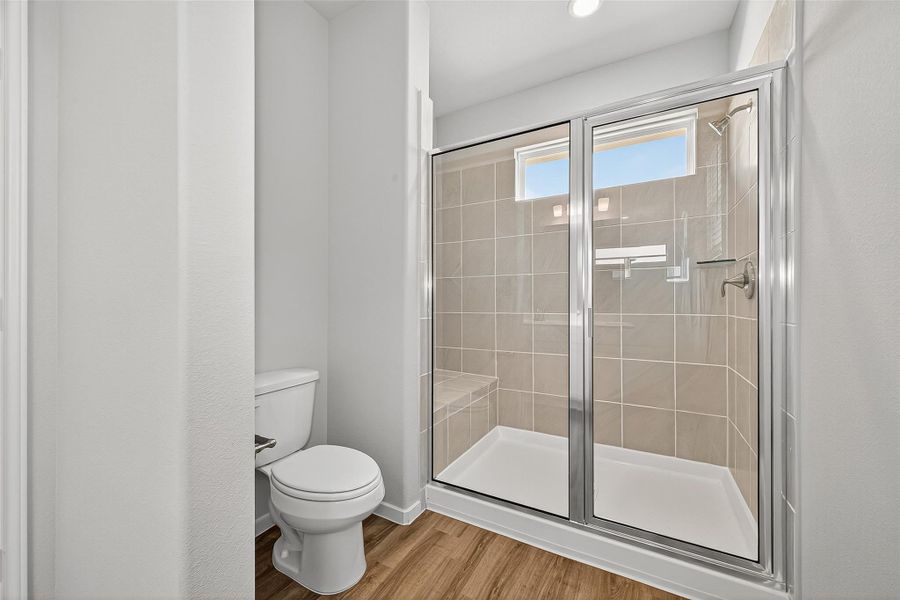 Furnished interior view inside a new home in Sunterra, Katy (Image 14).