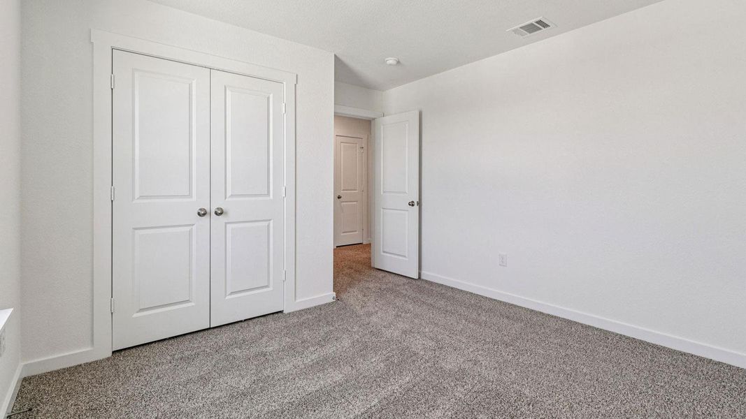 Spacious, unfurnished interior of a new home in Monarch Ranch, Manor (Image 22).