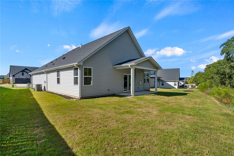Covered back porch - Photo is of actual home on th
