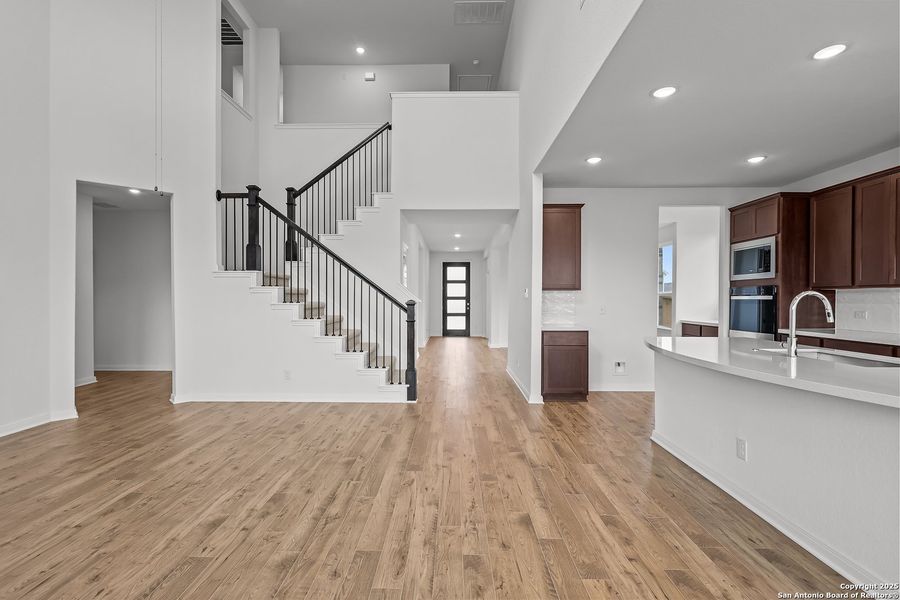Furnished interior view inside a new home in Homestead 75', Schertz (Image 9).