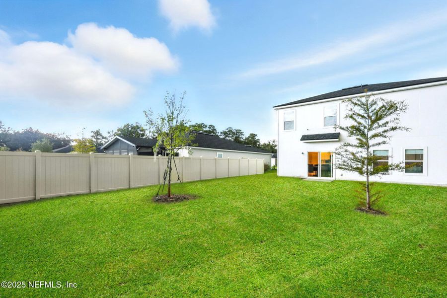 Front exterior of a new home in , Jacksonville, FL, highlighting curb appeal (Image 27).