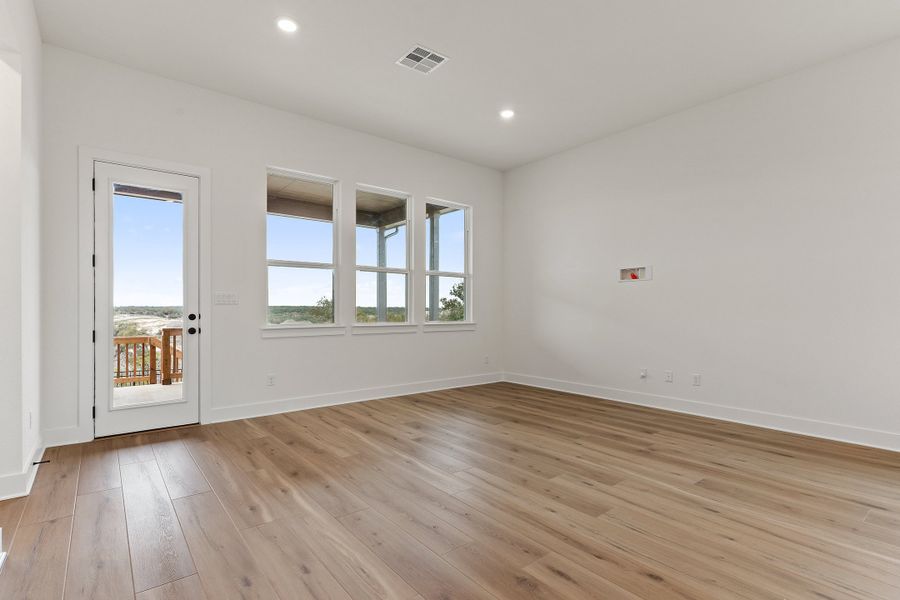 Representative unfurnished interior of a home built from the Waterville by Ashton Woods in The Trails at Carmel, Pflugerville (Image 47).