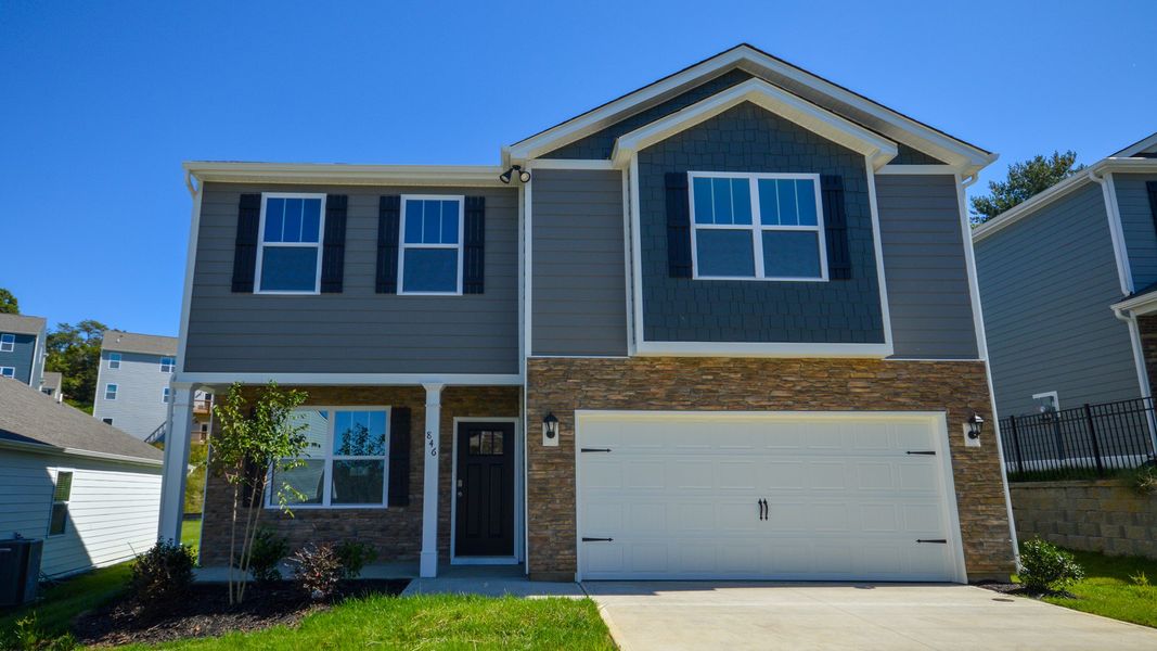 Front exterior of a new home in Rydele Heights, Asheville, NC, highlighting curb appeal (Image 1). Front exterior of a new home in Rydele Heights, Asheville, NC, highlighting curb appeal (Image 1).