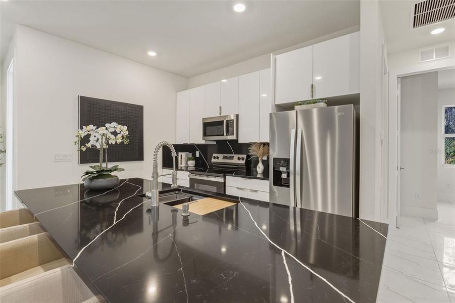 Furnished interior view inside a new home in , Port Charlotte (Image 6). Furnished interior view inside a new home in , Port Charlotte (Image 6).