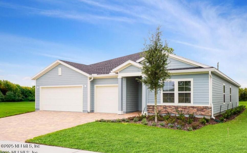 Front exterior of a new home in Tributary: Tributary Royal Collection, Yulee, FL, highlighting curb appeal (Image 2).