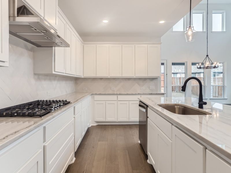 Plan 1542 Kitchen Representative Photo by American Legend Homes