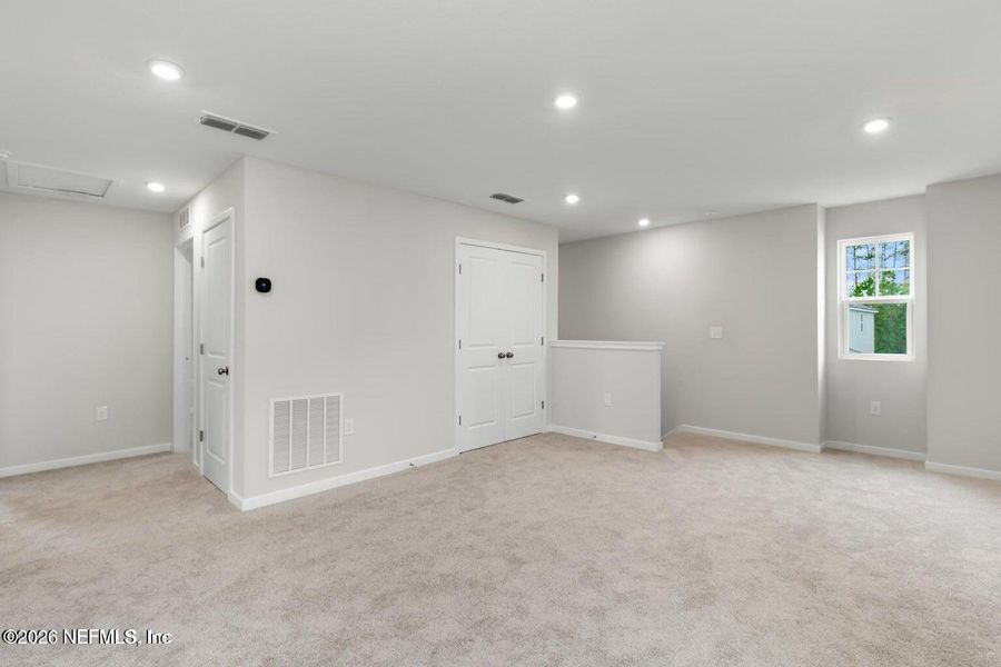 Spacious, unfurnished interior of a new home in The Landings at Pecan Park, Jacksonville (Image 13).