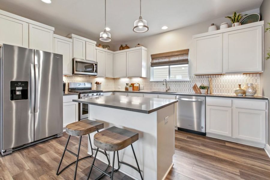 Furnished interior view inside a new home in Village At Manor Commons, Manor (Image 6).