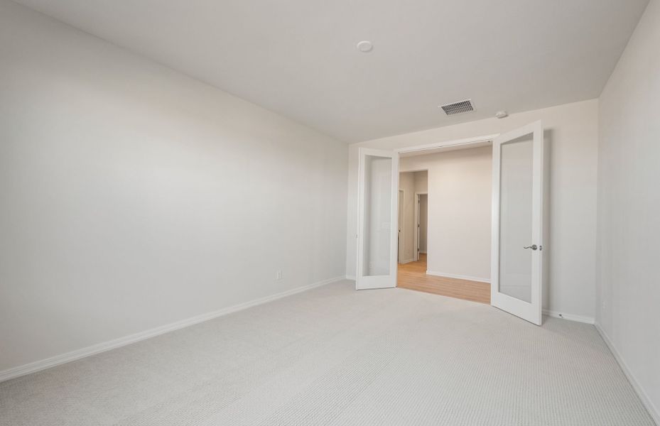 Representative unfurnished interior of a home built from the Verona by Pulte Homes in El Rancho Santa Rosa, Maricopa (Image 9).
