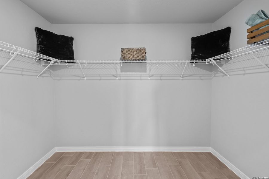 Spacious, unfurnished interior of a new home in Hunters Ranch, San Antonio (Image 22).