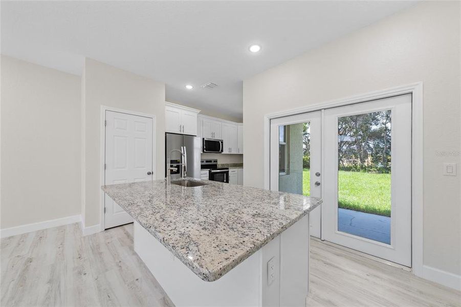 Furnished interior view inside a new home in , Kissimmee (Image 3).
