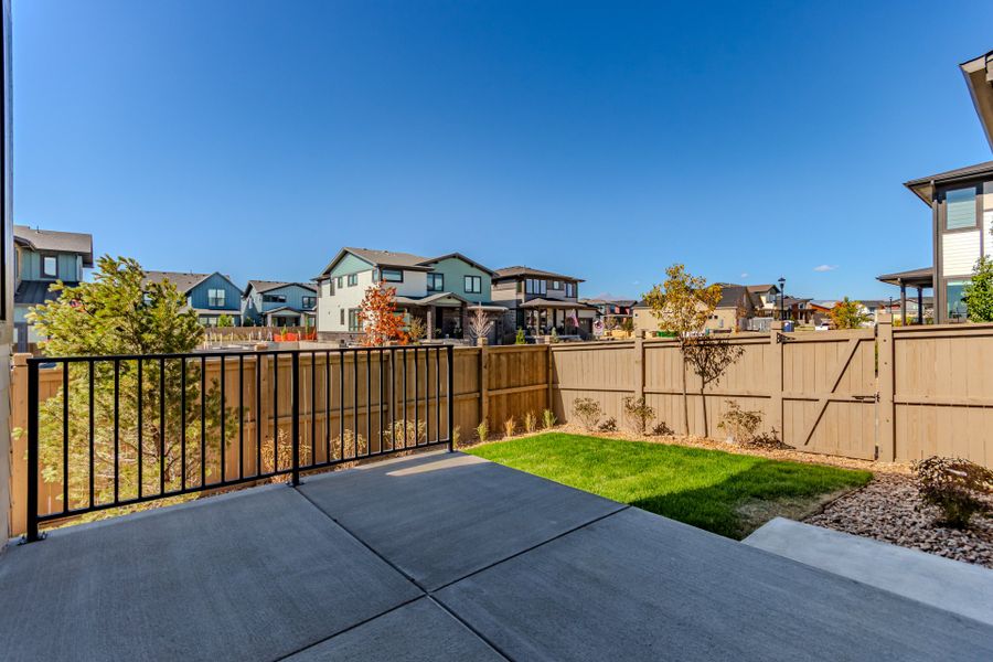Exterior details and patio area of a home in West Grange, Longmont (Image 25).